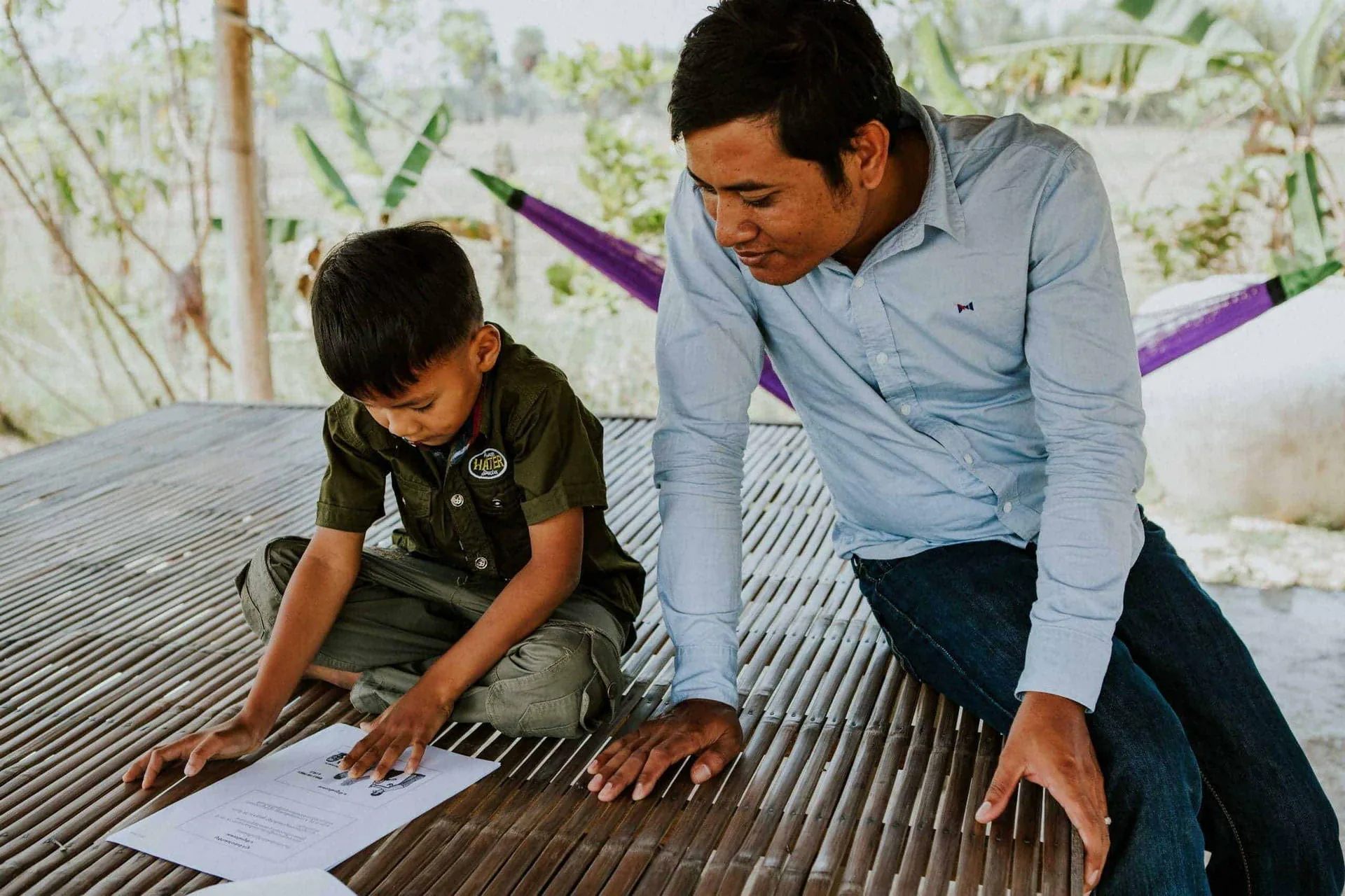 Children in Families flowchart of our model of alternative care Young boy and a Children in Families worker read paper together