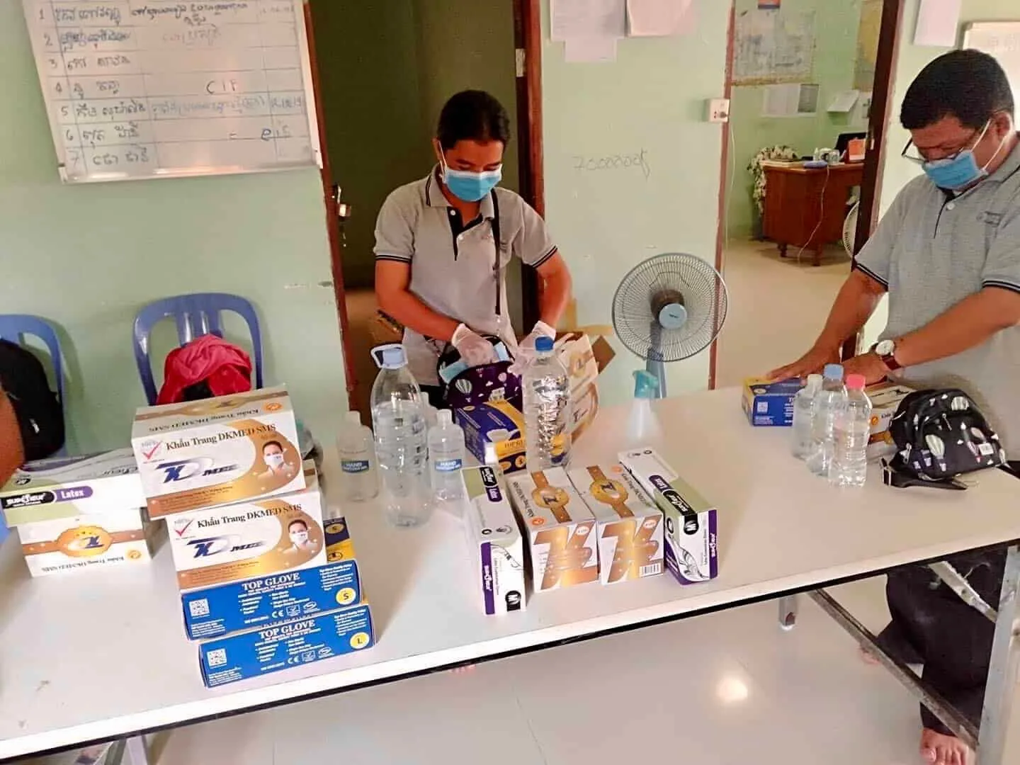 CIF staff packing essential hygiene for their home visits.